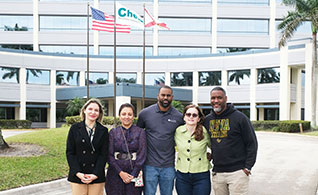 Shreyan Ray received the first-ever scholarship from the Chetu Foundation. From left, Shreyan Ray and Samanyu Gupta, teammates on the winning F1 Team, and Chetu Floor Managers Asheesh Barua, and Anuj Anand.